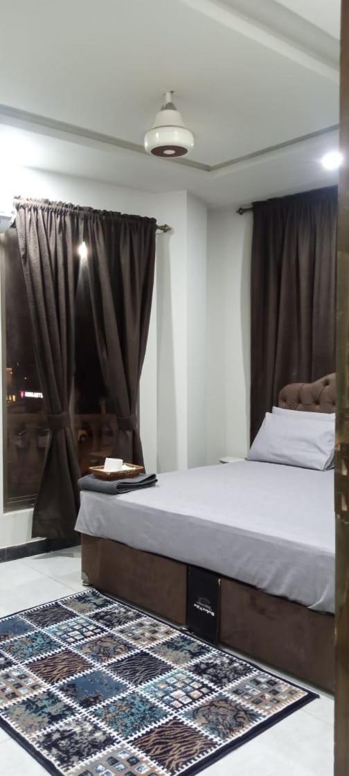 Northern Suites Bahria Town Равалпинди Стая снимка
